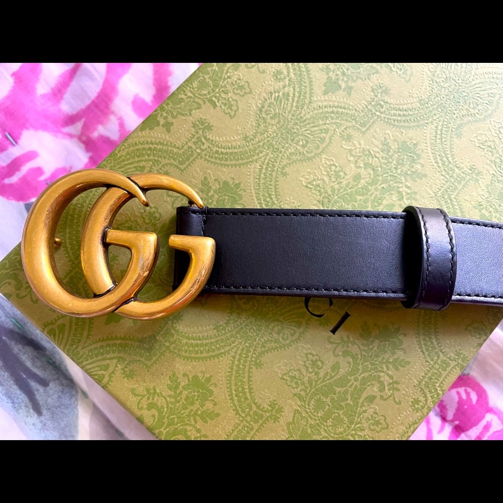 Gucci black logo belt.